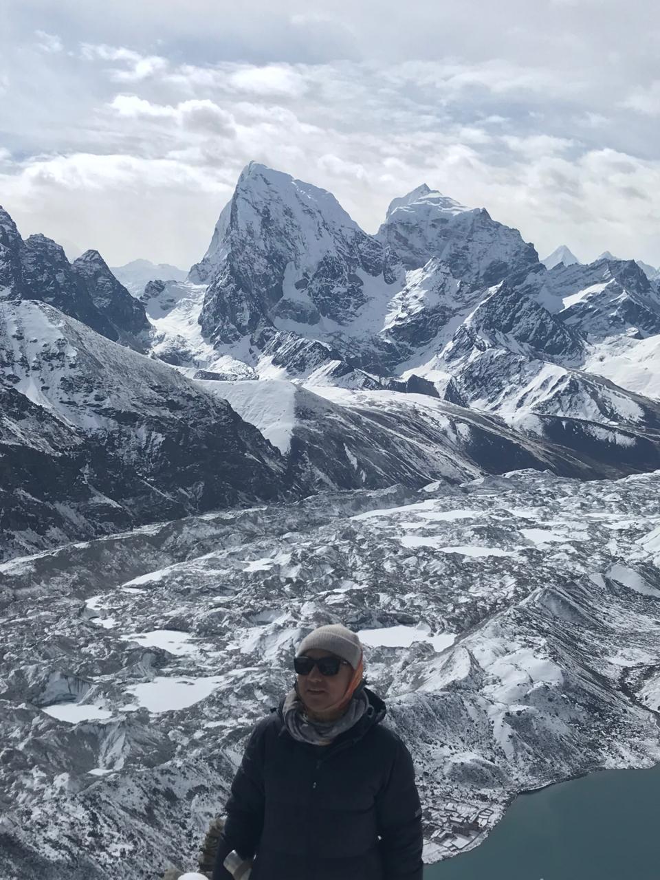 Trekkers above Himalayan peaks